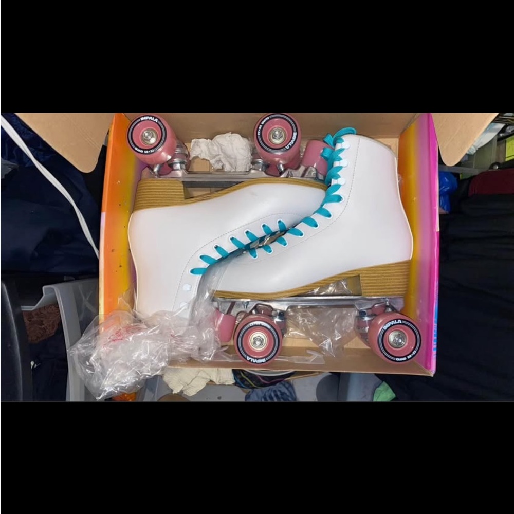 White Roller Skates with Blue Accents